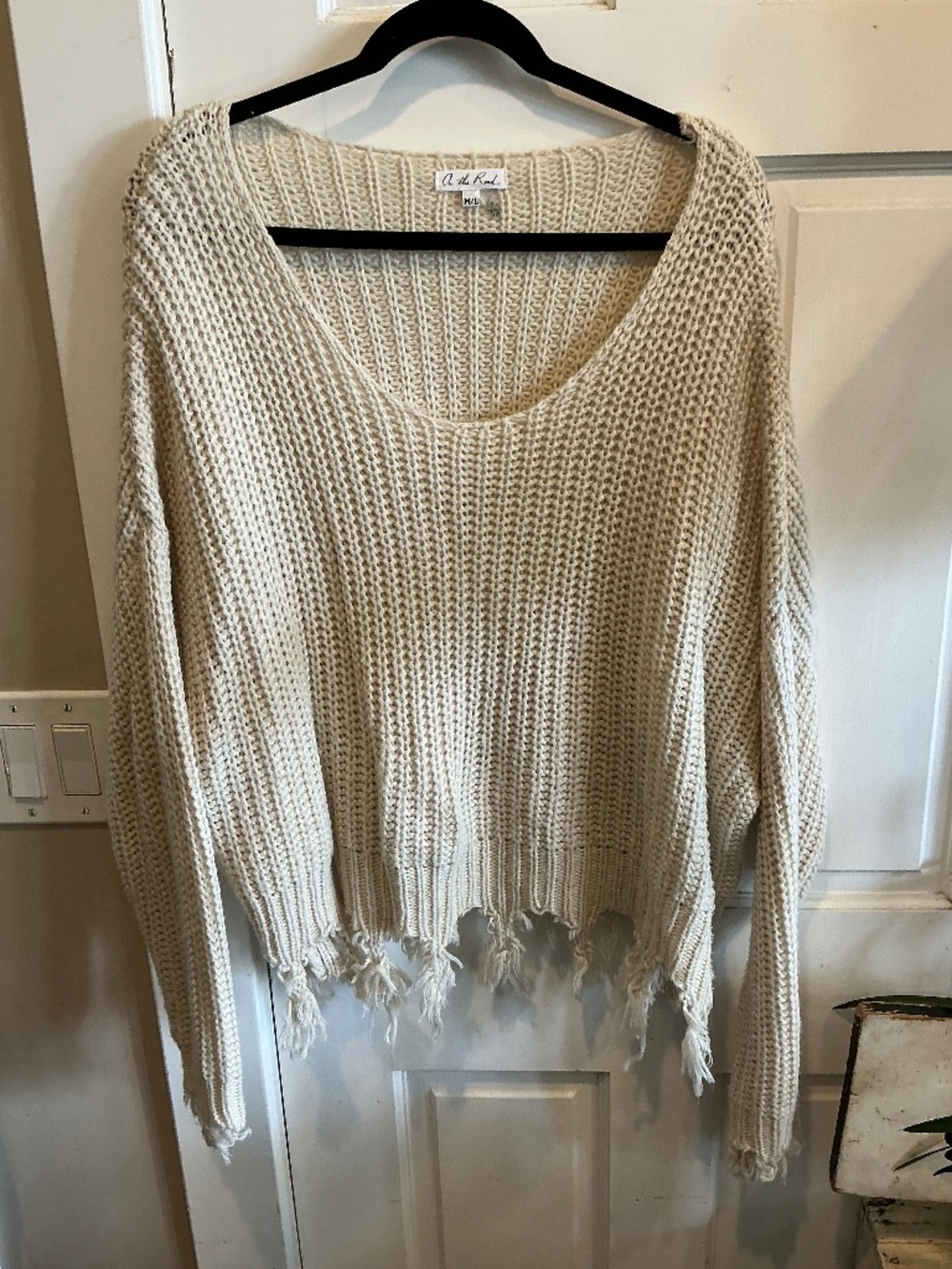 On the Road pullover sweater with raw hems!  Size m/l
